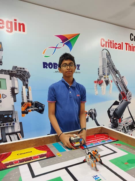Kids building robots in class