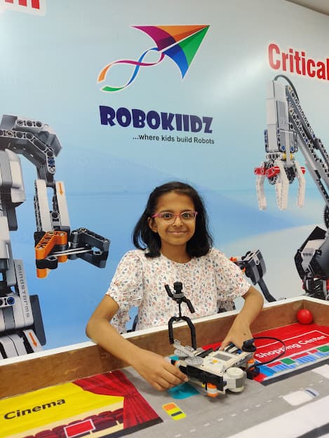 Students assembling a robot