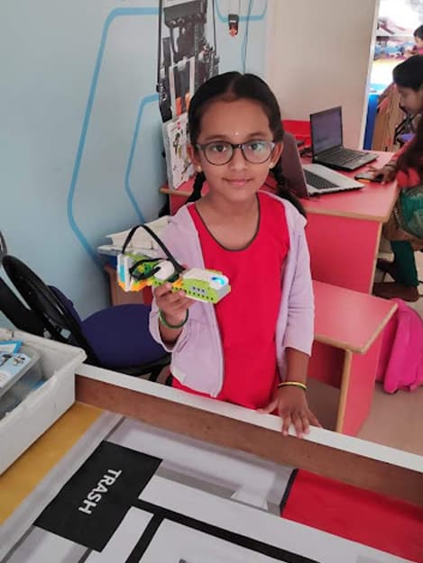 Kids testing their robot design